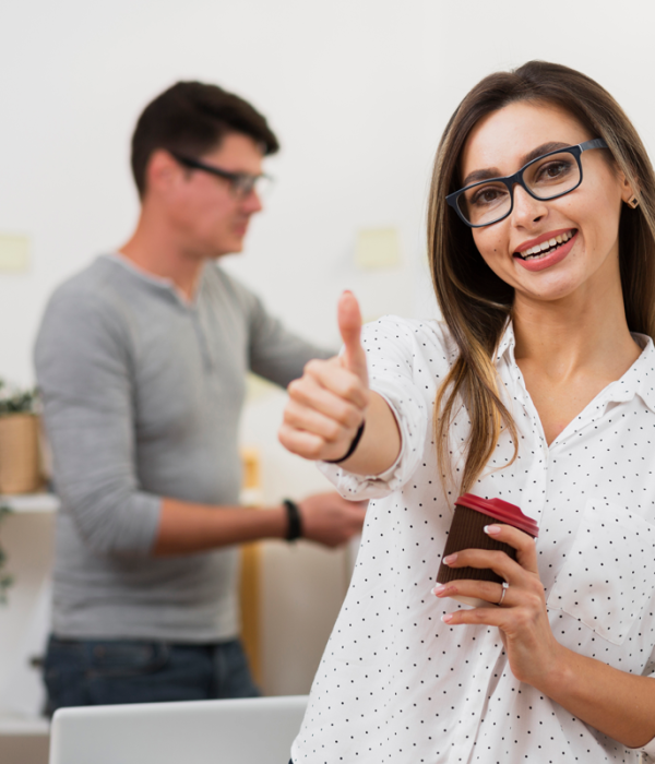 business-woman-holding-cup-coffee-showing-ok-sign business-woman-holding-cup-coffee-showing-ok-sign